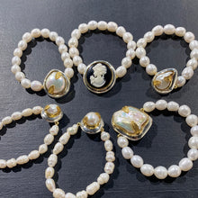 Load image into Gallery viewer, Pulseras con dijes de plata
